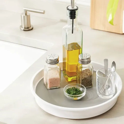 White and gray 10-inch rotating organizer holding kitchen essentials on a counter